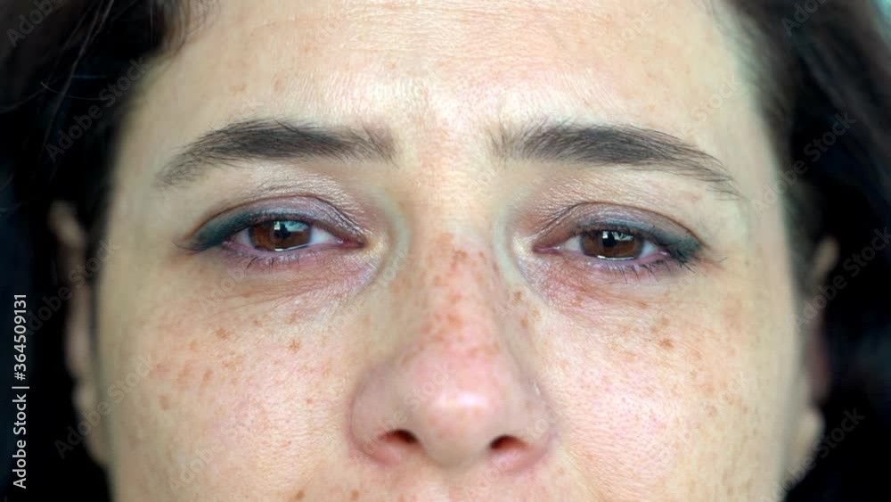Close up eyes of woman crying with tear Close up eyes of woman crying with tear