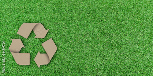 Eco environment concept, Recycle paper icon on green lawn background. copy space