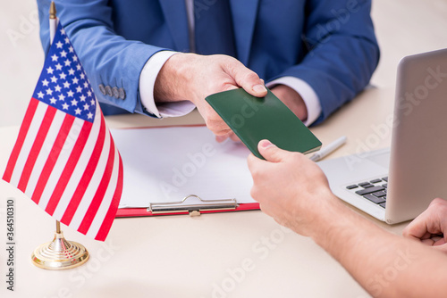 Young man visiting embassy for visa application