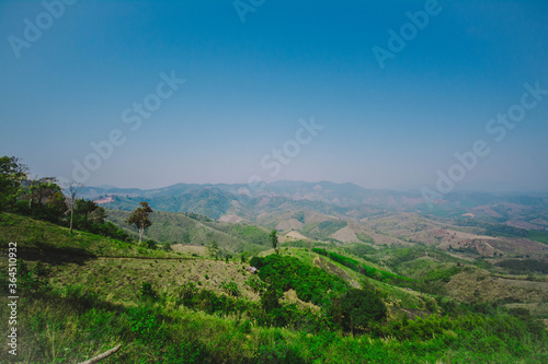 Watching the view on the top of a high hill