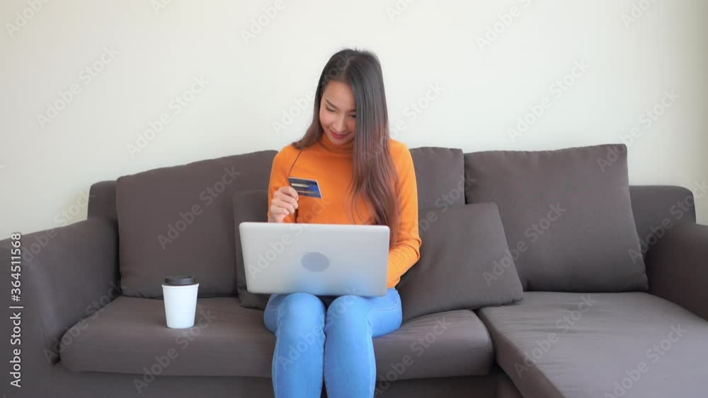 Asian buying happiness with credit card debt Asian buying happiness with credit card debt