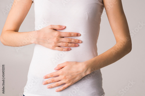 Wallpaper Mural abdominal pain woman Torontodigital.ca