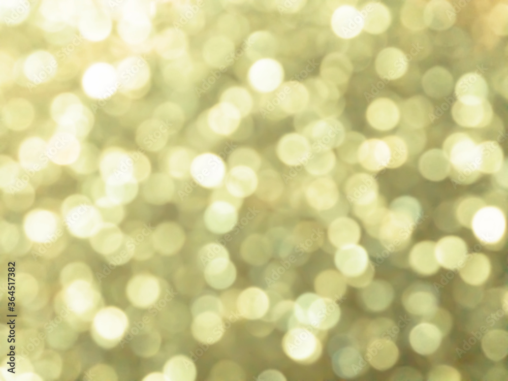 Abstract colorful gold yellow bokeh Look bright effect texture on black background. glitter vintage lights defocused elegant for cosmetics or Christmas. Sparkling magical dust particles. Abstract colorful gold yellow bokeh Look bright effect texture on black background. glitter vintage lights defocused elegant for cosmetics or Christmas. Sparkling magical dust particles.
