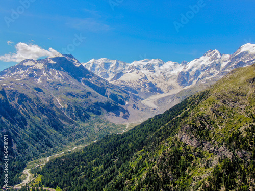 aerial of engadin mountains  morteratsch switzerland during summer with snowy mountains