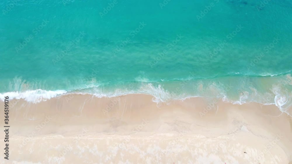4K Aerial view top view drone move Beautiful topical beach with white sand. Top view empty and clean beach. Beautiful Phuket beach is famous tourist destination at Andaman sea. 4K Aerial view top view drone move Beautiful topical beach with white sand. Top view empty and clean beach. Beautiful Phuket beach is famous tourist destination at Andaman sea.