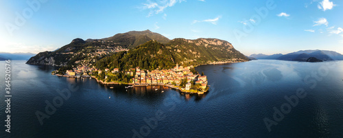 aerial panorama of  varenna village at lake como during summer in sunset   photo