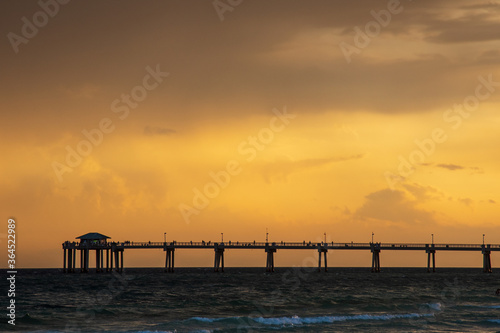 sunset over the pier