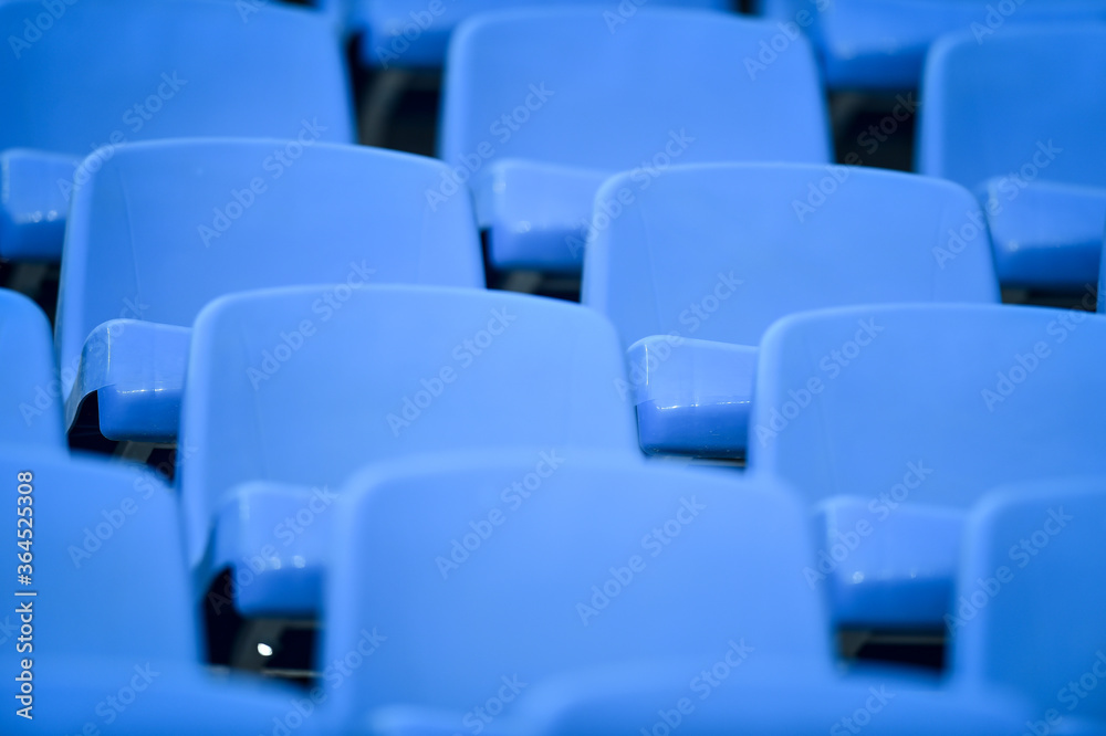 Empty soccer stadium tribune. As a safety measure during corona virus pandemic, soccer matches are taking place without public Empty soccer stadium tribune. As a safety measure during corona virus pandemic, soccer matches are taking place without public