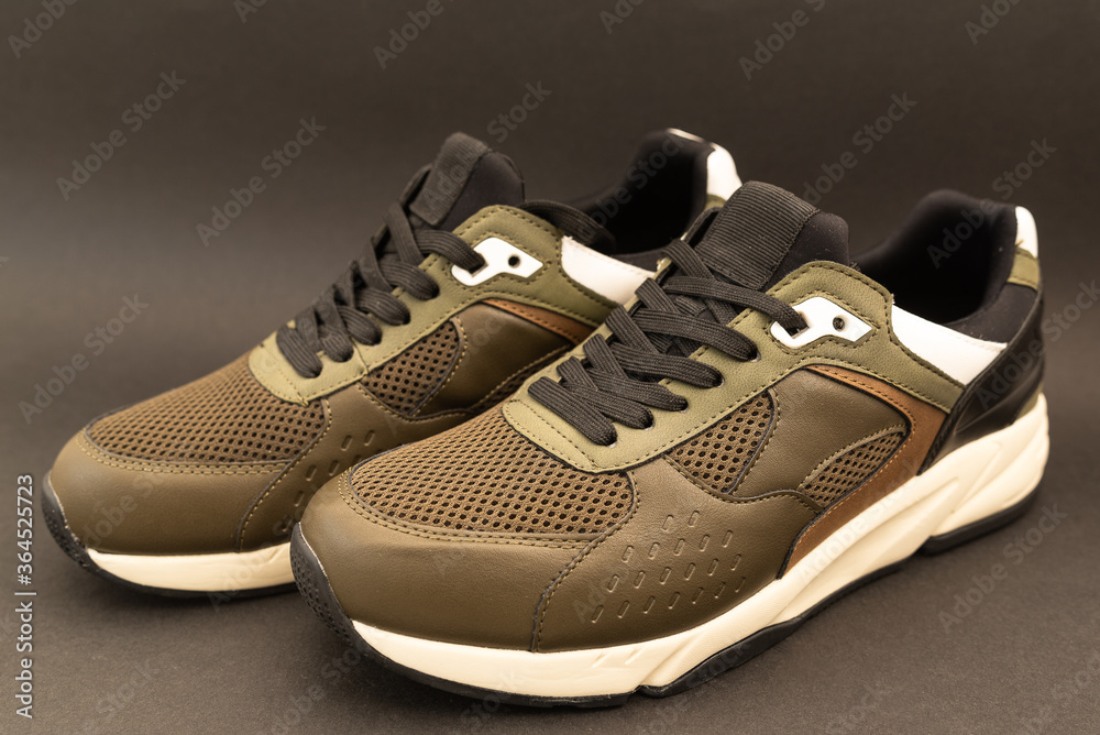 summer sports sneakers on dark background summer sports sneakers on dark background