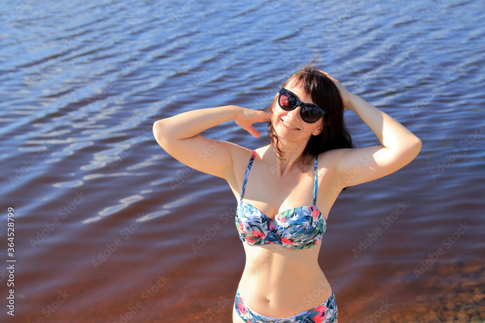 slim woman on the beach