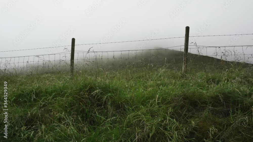 Man walking in the cloudy British countryside Man walking in the cloudy British countryside