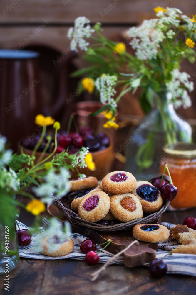Naklejka premium Thumbprint almond cookies with jam