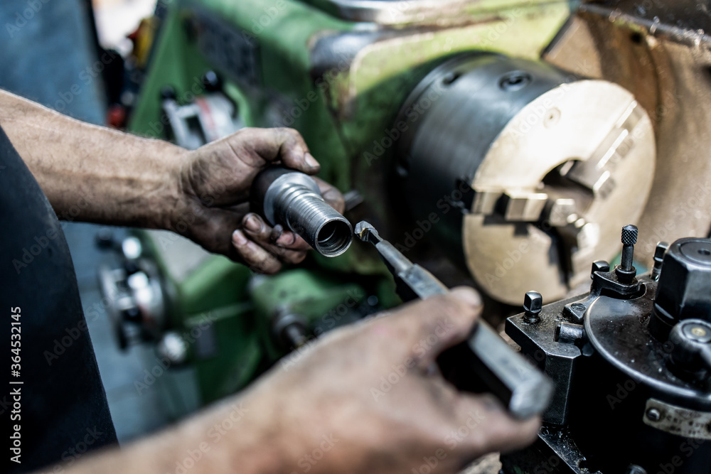 Close up shot of manual worker hands. Factory for industrial production of hydraulic hoses. Close up shot of manual worker hands. Factory for industrial production of hydraulic hoses.
