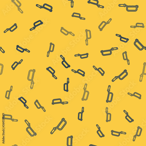Blue line Hacksaw icon isolated seamless pattern on yellow background. Metal saw for wood and metal. Vector Illustration.