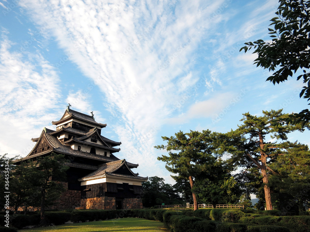 The Keep Tower (Tenshu) of Matsue Castle (松江城天守) under sunset in Matsue City, Shimane Prefecture, JAPAN The Keep Tower (Tenshu) of Matsue Castle (松江城天守) under sunset in Matsue City, Shimane Prefecture, JAPAN