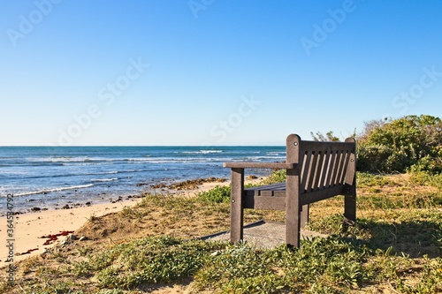 A bench made from recycled material next to the ocean. Photo taken at Cape Recife nature reserve in Port Elizabeth, South Africa. 