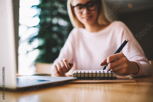 Canvastavla Young women writer scribing notes to her notebook for future romance, girl tryin