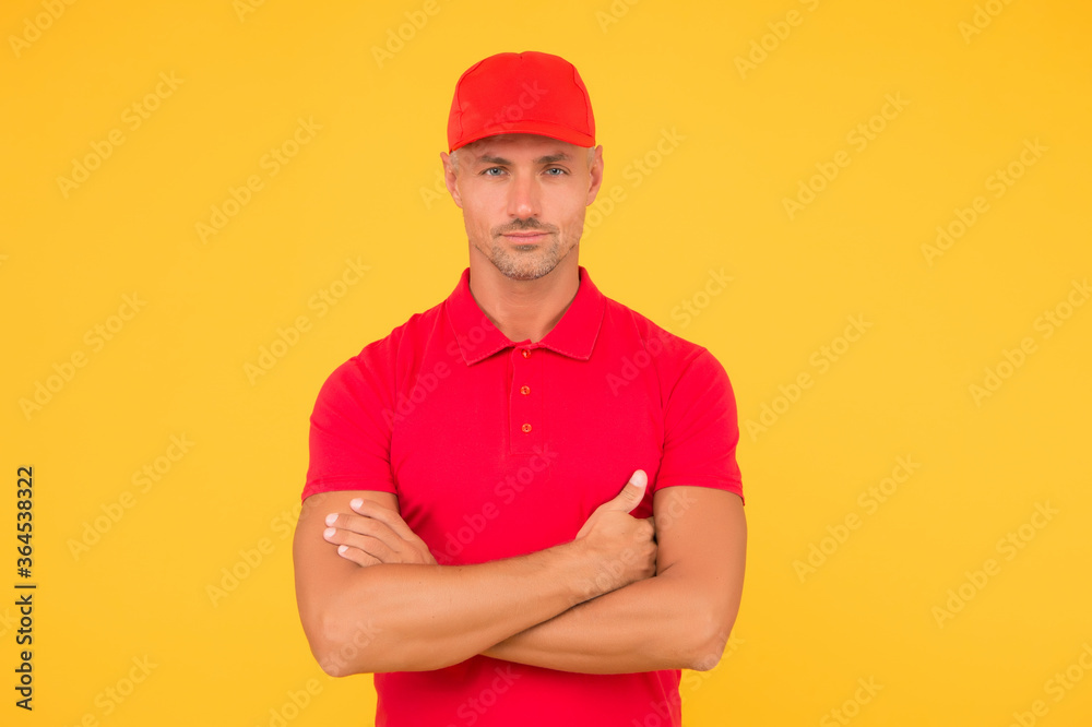Free services. Express delivery courier service. Parcel post package. Delivery copy space. Cashier shop staff. Black friday. Freight transportation. Perfect delivery. Delivery man yellow background