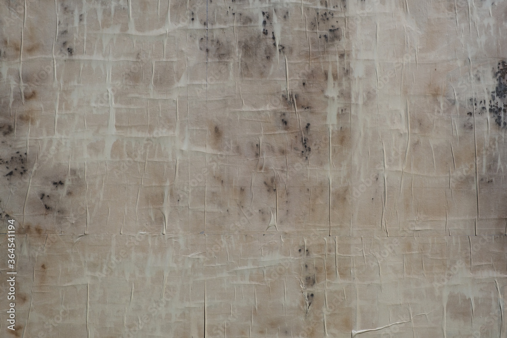 Fototapeta premium Old beige/gray paper texture, antique, spots, streaks.