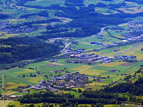 View of the fertile valley with settlemens between the Lakes Alpnachersee and Sarnersee from the Pilatus massif, Alpnach - Canton of Obwalden, Switzerland (Kanton Obwalden, Schweiz) photo