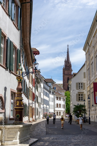 view of the historic old city center in downtown Basel with the cathedral in the background photo