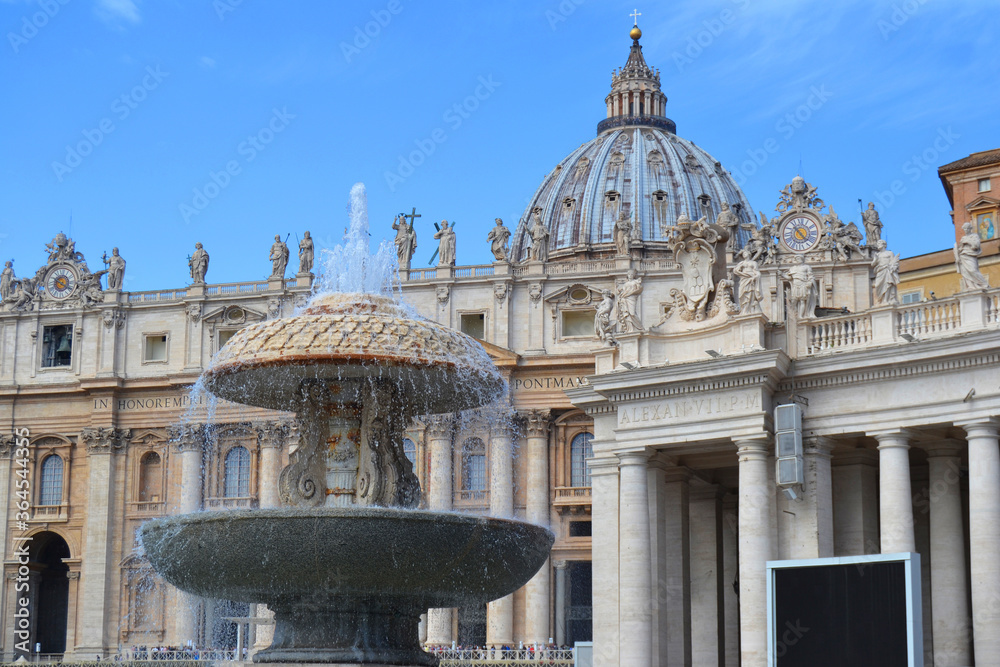 view of fountain in front of saint Peter's Dome in Rome 