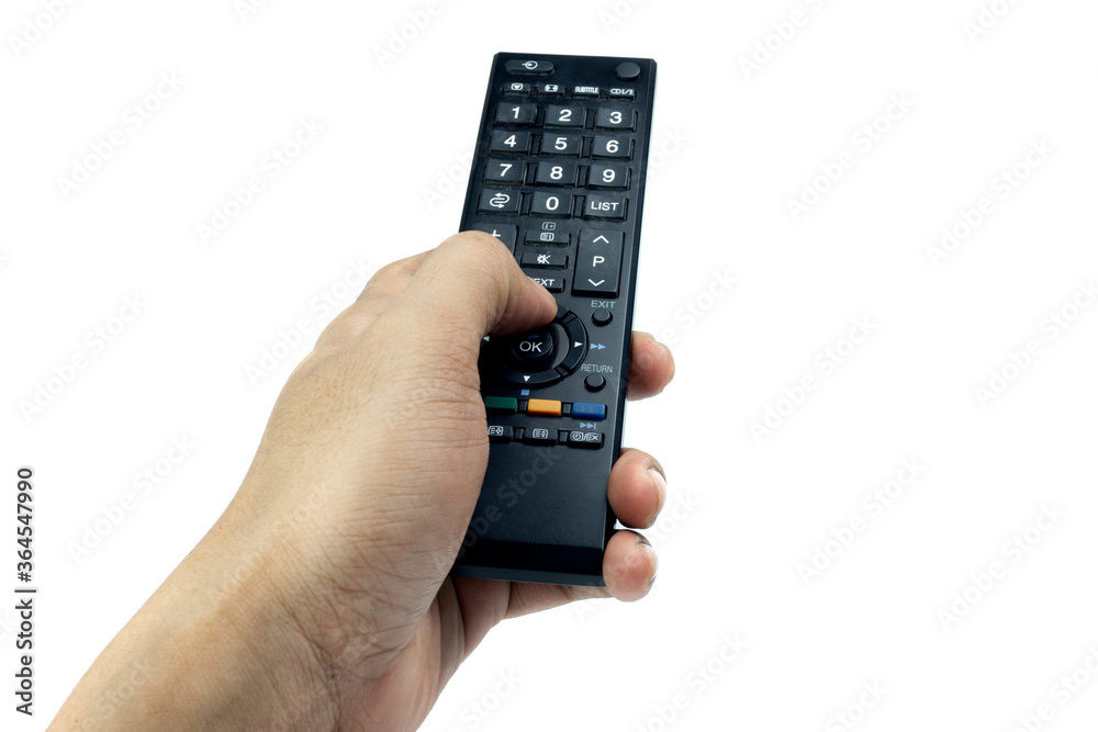 Hand holding television remote control isolated on white background Hand holding television remote control isolated on white background