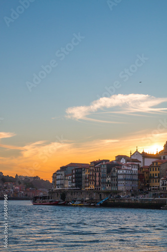 Porto or Oporto  is the second-largest city in Portugal and one of the Iberian Peninsula's major urban areas. Porto is famous for  Houses of Ribeira Square located in the historical center of Porto, P © Martina