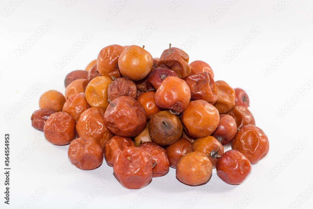 Ziziphus mauritiana sweet fruits, also known as Chinese date, Chinese apple, Indian plum, Indian jujube, Musawu or Maçanica. It is quite nutritious and rich in vitamin C Ziziphus mauritiana sweet fruits, also known as Chinese date, Chinese apple, Indian plum, Indian jujube, Musawu or Maçanica. It is quite nutritious and rich in vitamin C
