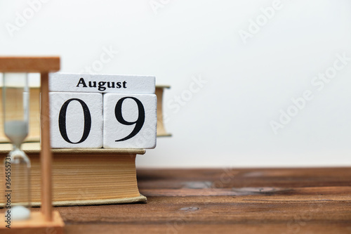 9th august - ninth day month calendar concept on wooden blocks with copy space