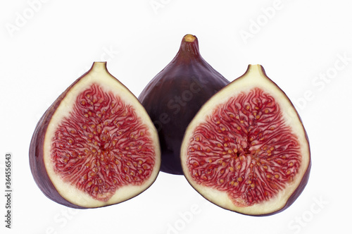 Sliced fresh figs on white background