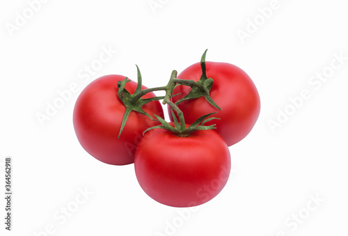 Three fresh red tomato isolated on white background