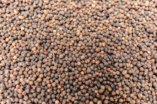 Full frame view of dried aromatic peppercorns background
