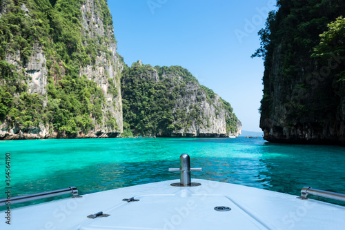 Limestone rocks  clear turquoise water  Pileh Lagoon  Thailand.