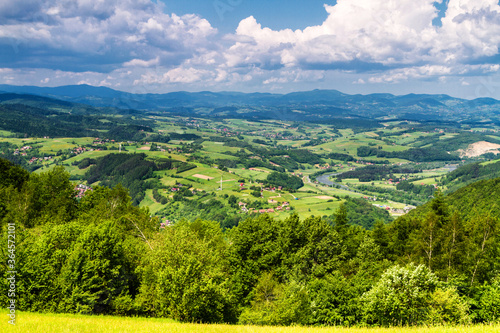 Fototapeta Naklejka Na Ścianę i Meble -  View of Polish town Rytro from Beskidy Mountains (Beskid Sadecki). Beskid Sadecki is a part of Karpaty (Carpathian mountains). Europe