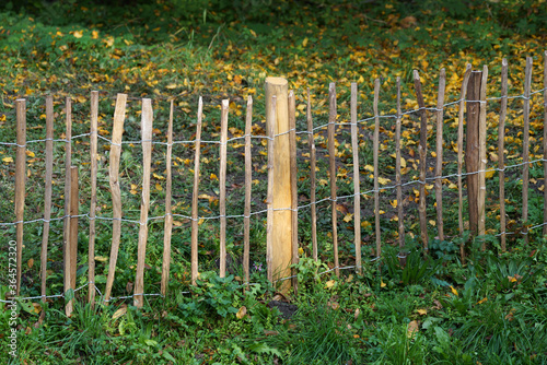 Handcrafted fence photographed outdoors in the best of daylight