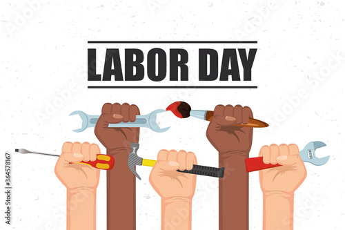 happy labor day celebration with hands lifting tools
