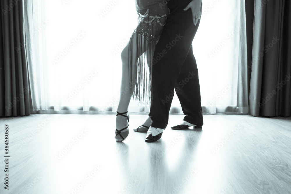 Legs of male and female latin salsa dancers Legs of male and female latin salsa dancers