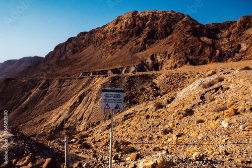 Falling hazard attention sign, Dead Sea Scrolls Israel. photo