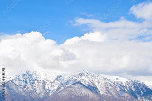 View of cumulus clouds over the mountains © Kseniia