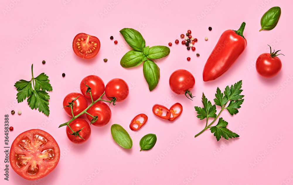 Tomato, basil, spices, bell chili pepper. Vegan diet food, creative composition on pink. Fresh basil, herb, cherry tomatoes layout, cooking sauce colorful concept, top view. Tomato, basil, spices, bell chili pepper. Vegan diet food, creative composition on pink. Fresh basil, herb, cherry tomatoes layout, cooking sauce colorful concept, top view.