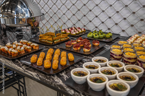 Catering, set table with delicious snacks, buffet