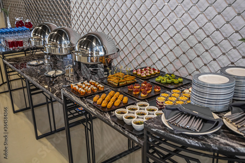 Catering, set table with delicious snacks, buffet