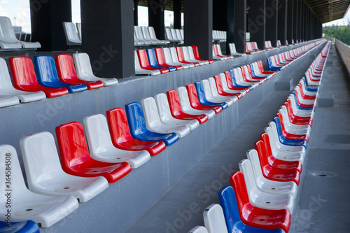 Empty spectator stands, empty chairs