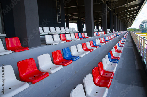 Empty spectator stands, empty chairs