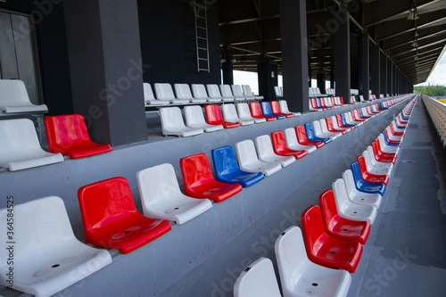 Empty spectator stands, empty chairs