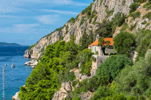 Gospe od Prizidnice church on the cliff on Ciovo island, Croatia photo