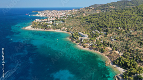Fototapeta Naklejka Na Ścianę i Meble -  Aerial drone photo of secluded beaches in Ligoneri area near old town of Spetses island, Saronic gulf, Greece