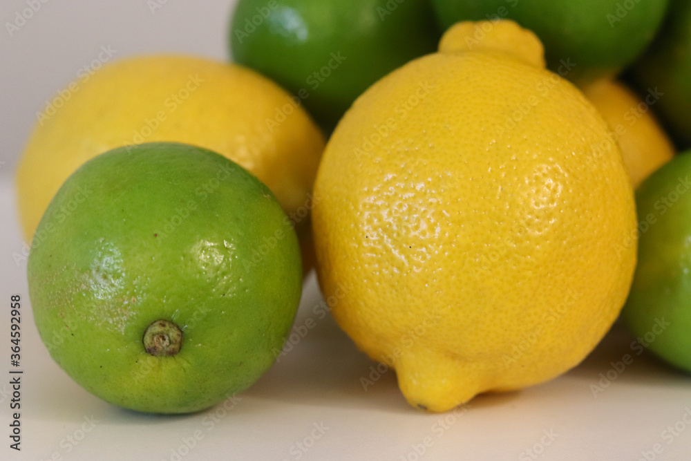 Beautiful lemons arranged on a table. A fruit rich in vitamin c. Beautiful lemons arranged on a table. A fruit rich in vitamin c.