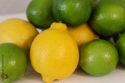 Fototapeta Naklejka Na Ścianę i Meble -  Beautiful lemons arranged on a table. A fruit rich in vitamin c.